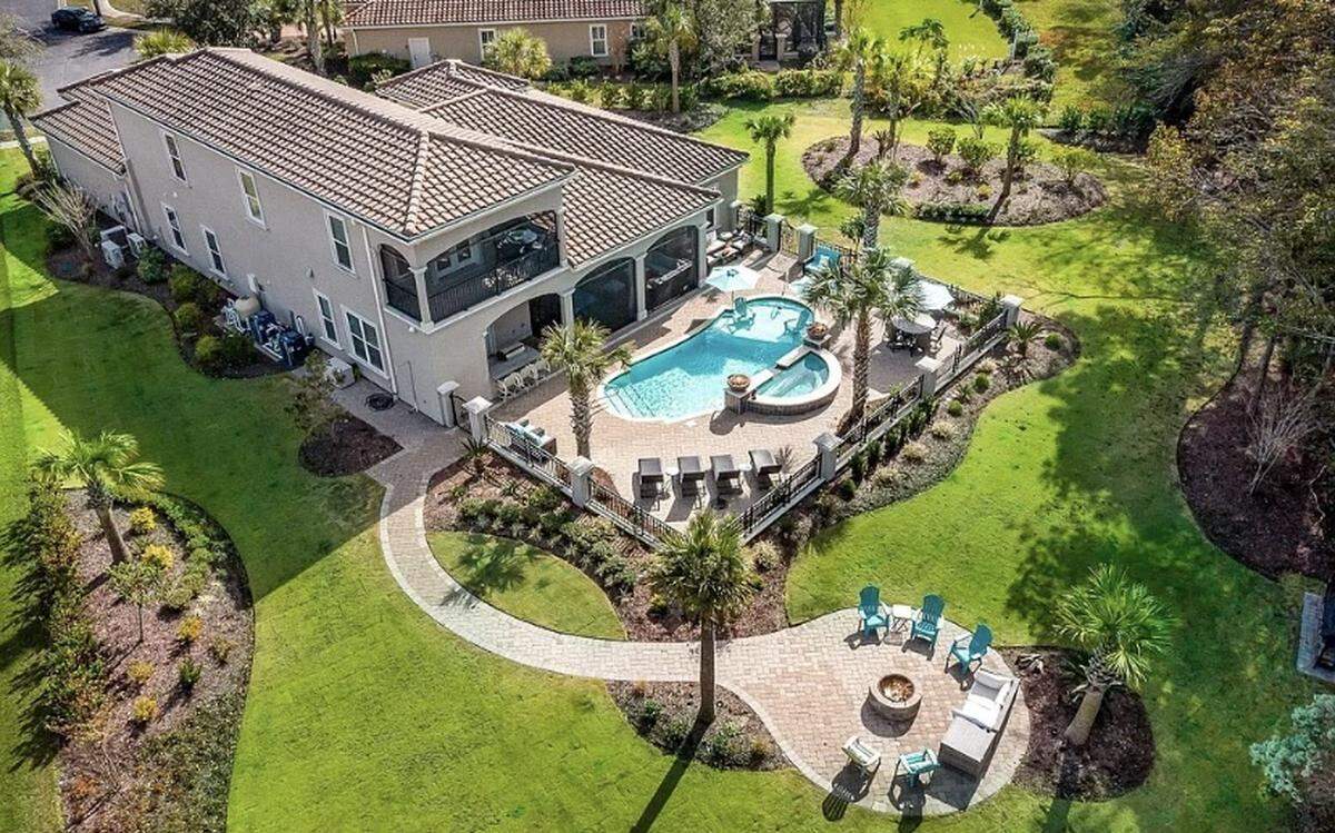 A home in the gated Grand Dunes community in Myrtle Beach is listed for $1.7 million on Zillow. It has four bedrooms and a three-car garage.