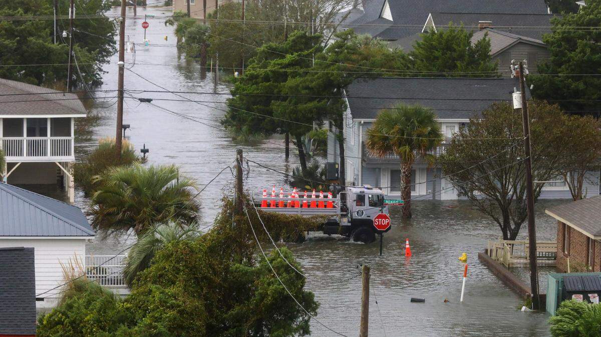 A high water vehicle passes through flooded streets in North Myrtle Beach as Hurricane Ian’s storm surge inundates the area. Conditions deteriorated throughout the day on Friday in North Myrtle Beach as Hurricane Ian made landfall near Georgetown, S.C. The Cherry Grove area experienced severe flooding due to Ian’s storm surge on Friday, September 30, 2022.