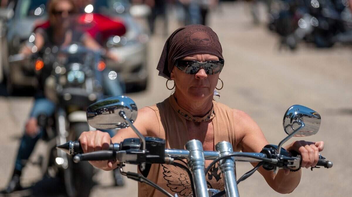 Helen Owens of Rockhill, N.C. rides into Murrells Inlet, one of the many female motorcycle enthusiasts that are taking to the streets. Myrtle Beach Bike Week 2021 Spring Rally is in full roar this week with thousands of bikers cruising into area bars on the south end of the Grand Strand. May 14, 2021.