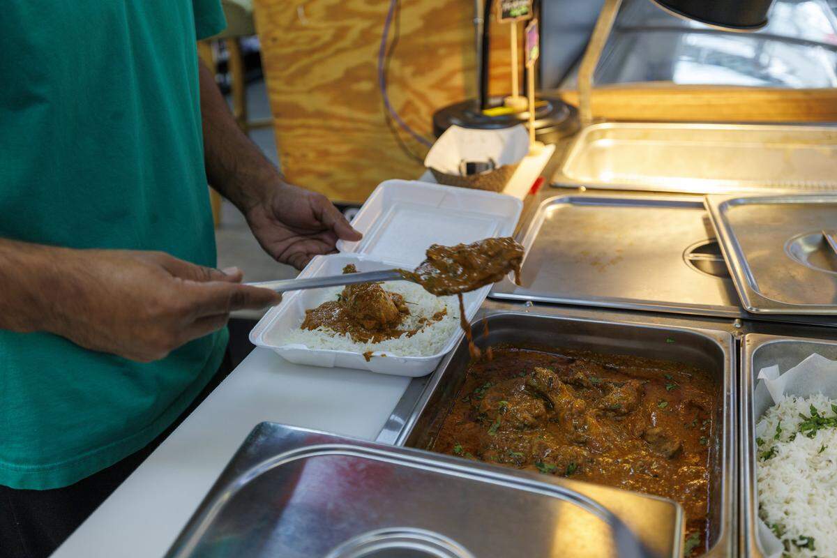 The 4-Way Fuel Sunoco gas station in Conway is now offering Indian cuisine. Laxmi and Lovey Vaid have been operating the station for ten years but Lovey Vaid, a trained chef, has recently started cooking for the station. The menu includes tandoori chicken wraps, butter chicken and samosas topped with chickpea chaat masala. His specialty offerings has is garnering attention on social media. Aug. 8, 2025.