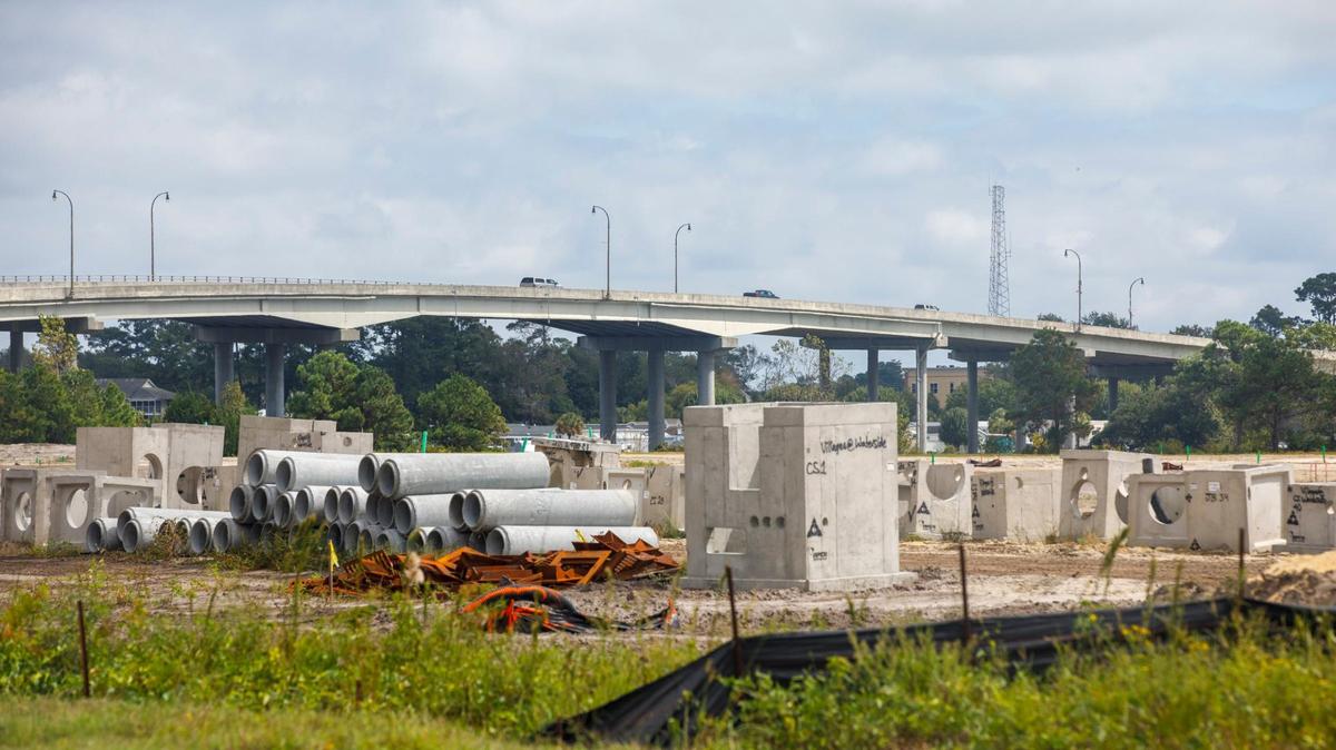 Along Robert Edge Parkway near North Myrtle Beach, S.C., construction crews prepare a site for development. A permit for the area lists it as a major subdivision. Oct. 2, 2024.