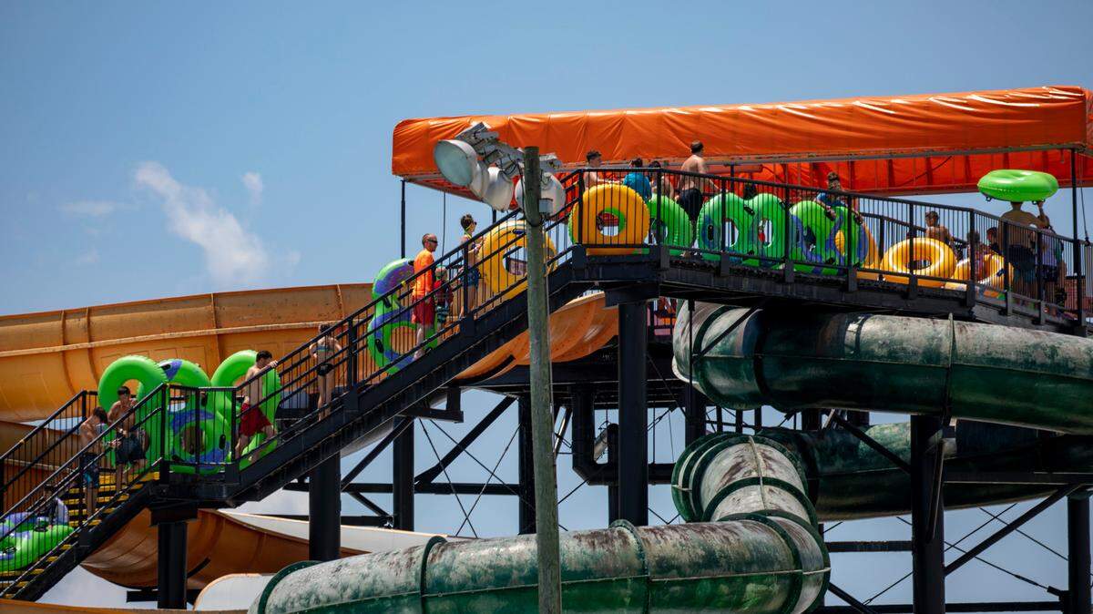,Tourists wait to plunge down one of the many slides at Surfside Beach’s Wild Water and Wheels in this Sun News file photo. The .now shuttered park is being eyed for redevelopment.