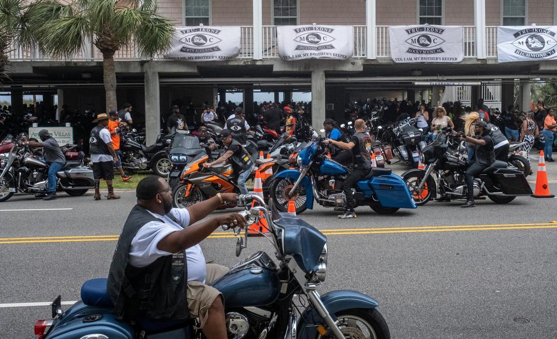 Bikers crowd into a parking garage in North Myrtle Beach for a rainy day party on Friday afternoon. The Atlantic Beach Bike Festival, aka “Black Bike Week,” returned on Friday after being canceled the last two years due to COVID-19. The event got off to a slow start in Atlantic Beach due to rain but parties were held in covered parking garages around North Myrtle Beach and as the rain cleared, the bikers returned. May 27, 2022.