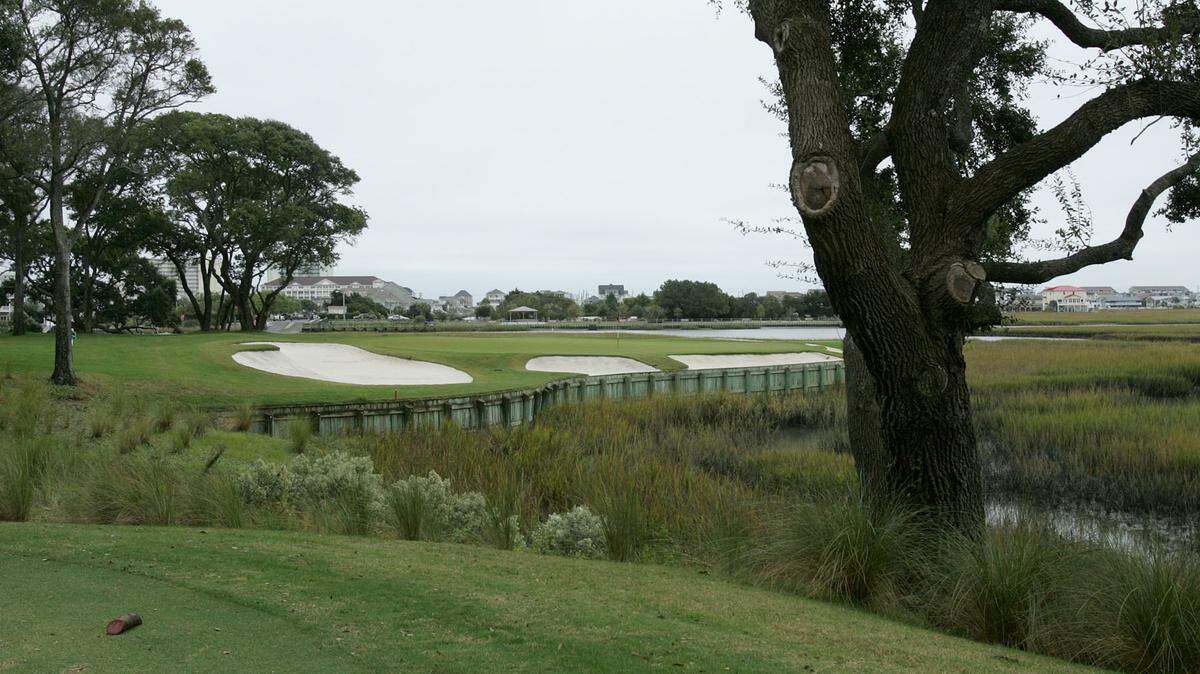 The 189-yard, par-3 12th hole at Tidewater Golf Club wraps around the marsh. (File Photo) Photos by Tom Murray tmurray@thesunnews.com