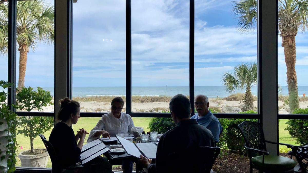 Diners enjoy a sunny meal at Sea Captain’s House. The Myrtle Beach eatery is a popular spot to eat breakfast with coastal views. TSN March 6, 2023 File. 