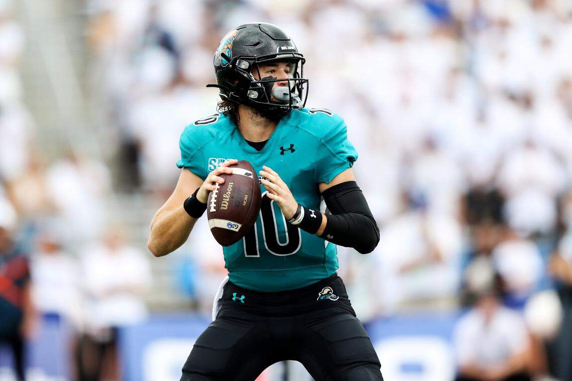 Coastal Carolina quarterback Grayson McCall (10) looks to pass during the first half of a NCAA college football game against Buffalo in Buffalo, N.Y. on Saturday, Sept. 18, 2021. (AP Photo/Joshua Bessex)