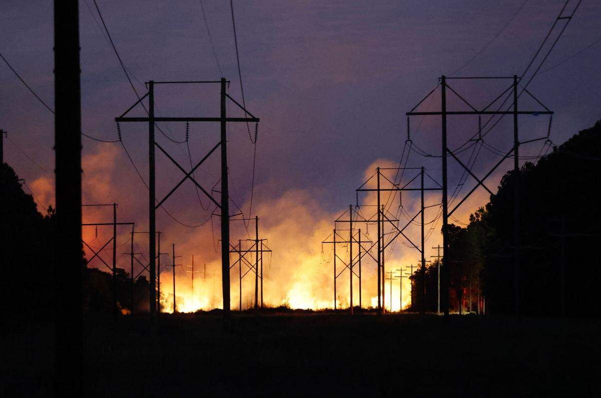 Fires continue to flare Sunday behind Springlake in Carolina Forest as more communities are evacuated. Firefighters continue to battle wildfires that rage in the Myrtle Beach area. It’s estimated that more than 1,500 acres are burning. March 2, 2025