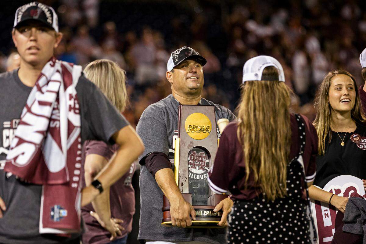 Mississippi State head coach Chris Lemonis, a Socastee High graduate, holds the NCAA trophy after the 2021 College World Series national championship series between the Bulldogs and Vanderbilt at TD Ameritrade Park in Omaha, Nebraska.