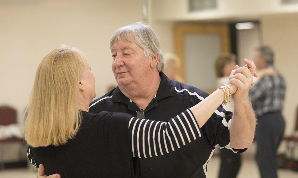 Joe DeFeo ballroom dances with his fiancee, Sandra Lucas-Hyde. The Horry County school board chair also teaches firearms classes, and helps teach ballroom dancing on Wednesday nights. DeFeo is also a helicopter pilot, state constable, and karaoke D.J. in his spare time.