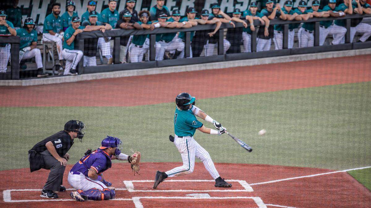 Former Coastal player Dale Thomas hits a home run against Clemson on in 2022. CCU’s baseball team is ending the 2023 season with a winning record. May 17, 2022.