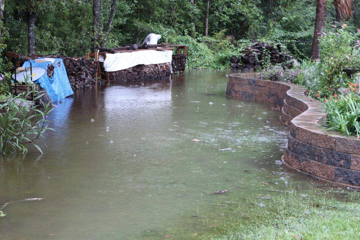 Yard flooding following Hurricane Dorian near Highway 90. 