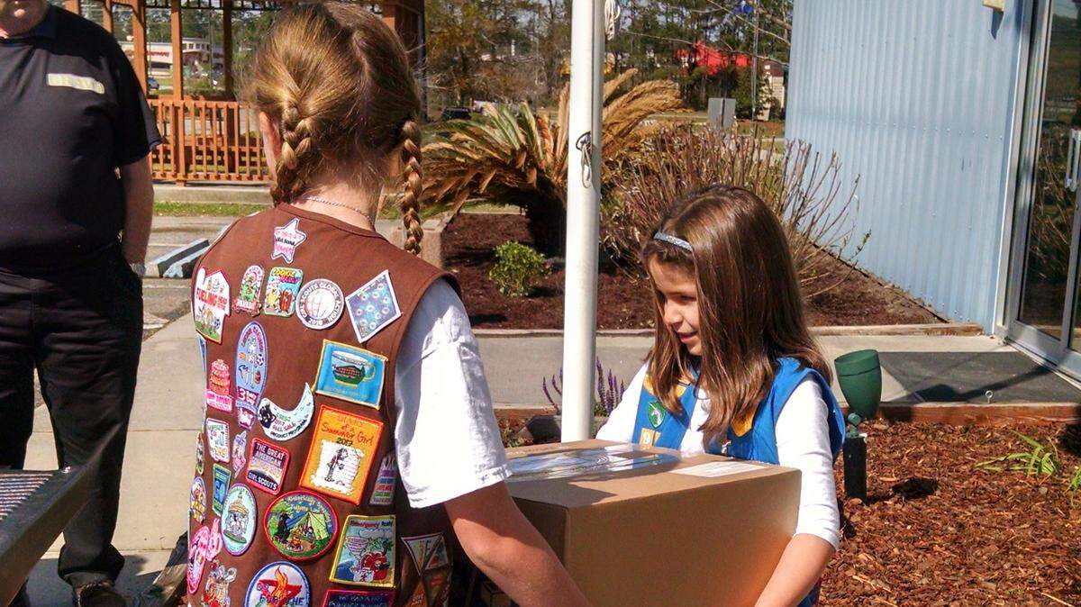 As a way of saying thank you to military personnel, Girl Scout Troop 91, based out of North Myrtle Beach, sold 1,013 boxes of cookies that are being sent to the men and women aboard the USS New York.