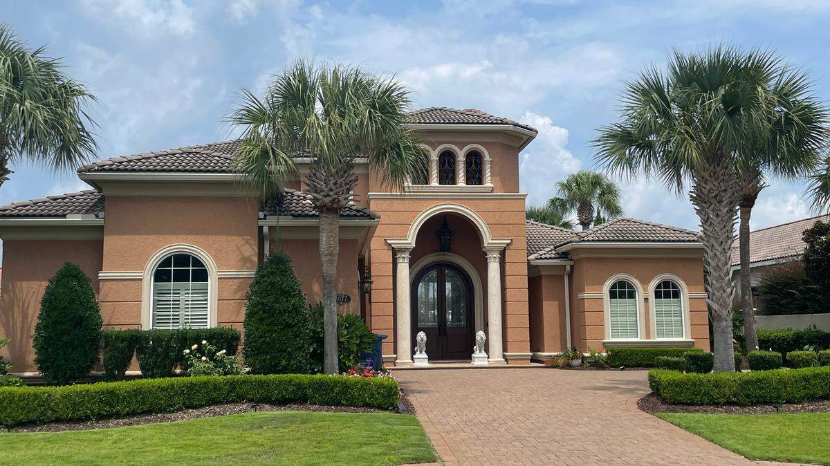 This is a home in the Castillo del Mar section of the Grande Dunes area. The Grande Dunes area started as a custom home neighborhood near several golf courses, and this specific home was built in 2001.