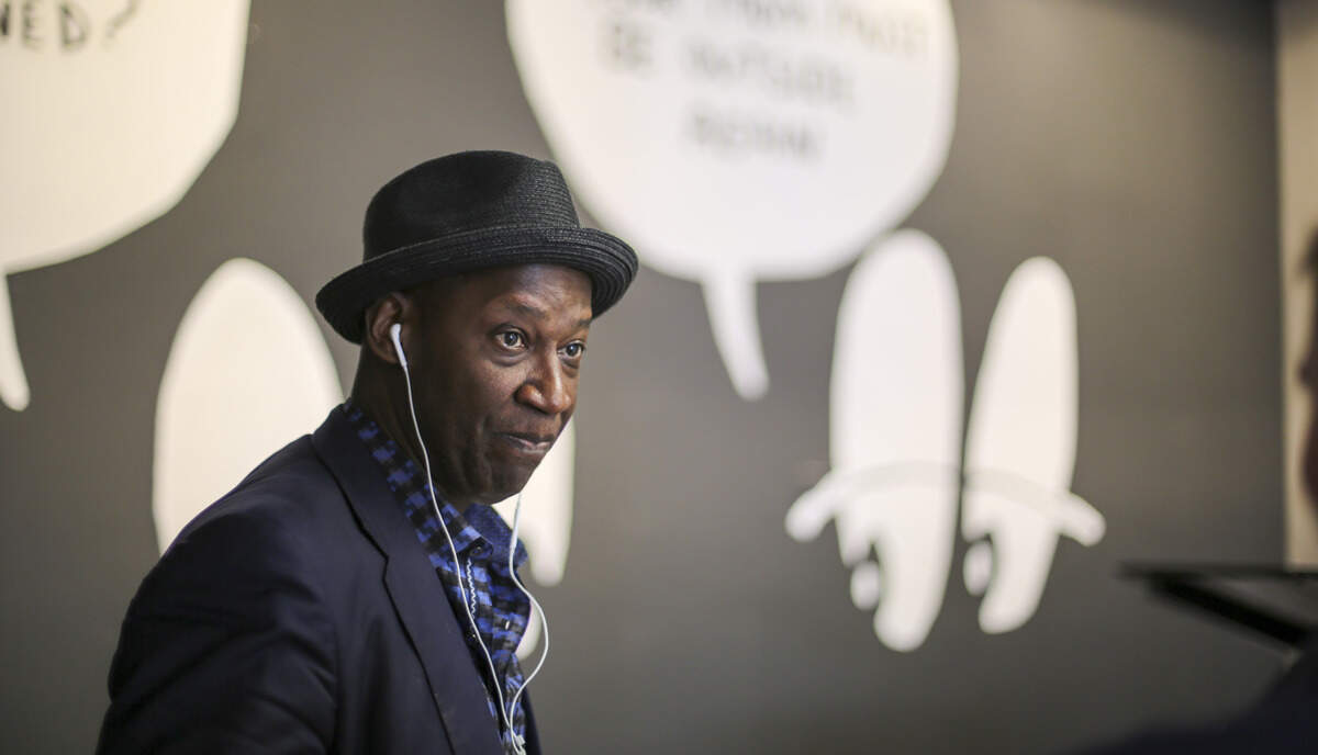 James Stephens III, also known as The Man of 1,000 Voices, stands in front his ‘yo mama’ joke mural at The Asher Theatre at Fantasy Harbor in Myrtle Beach, SC. Stephens has organized a reunion of Def Comedy Jam comics for performances at his venue from May 23-25.