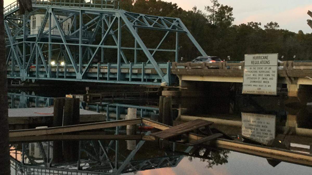 Flooding has subsided but persists near dusk Wednesday on the south side of the Socastee Swing Bridge on the Intracoastal Waterway. Boaters still require permission to get on the water between the bridge and Sandy River in the Pawleys Island area because of high water.