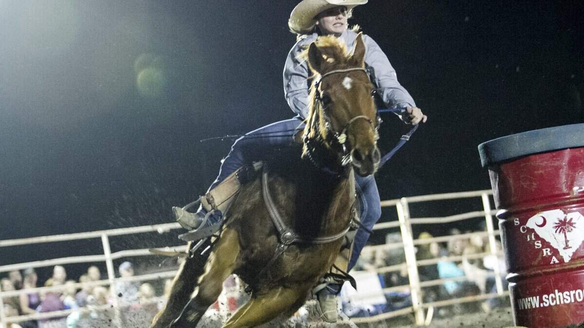 Marybeth Rollings rounds a barrel during the S.C. High School Rodeo Association event held this weekend at RES-LES Farms in Conway. Friday, March 11, 2016.