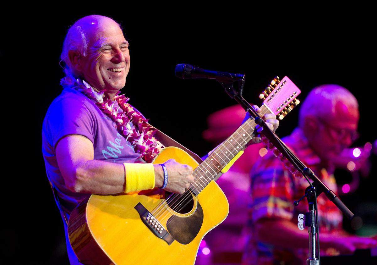 Jimmy Buffett performs in concert in this file photo.