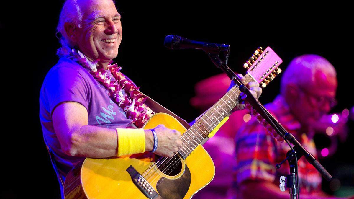 Jimmy Buffett performs in concert in this file photo.
