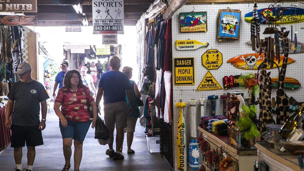 Customers browse the Hudson's Surfside Flea Market in Surfside Beach.. Sept. 29, 2017.
