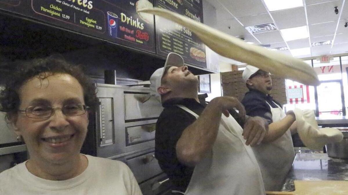 
The Sorce family of Gino's Real New York Pizza works together at the Gator Hole Plaza shop in North Myrtle Beach. They are, from left, Nancy Sorce, Francesco Sorce Jr. and Kris Rivera.
