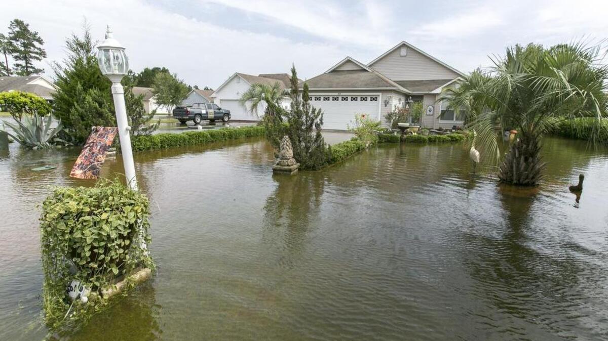 
A house and yard in The Refuge subdivision of Little River, which was flooded by the early October 2015 deluge. 
