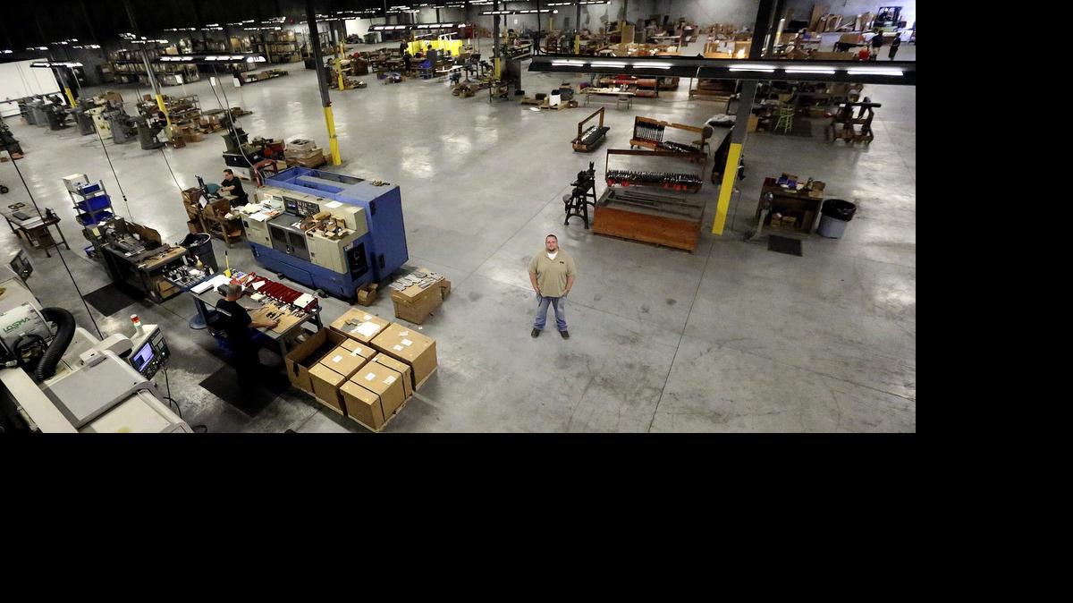
PTR Industries has rehired employees it laid off, added more workers and is working to manufacture a 9mm to be marketed to the military. On May 28 Josh Fiorini, PTR chief executive officer, stands in the plant in the Cool Springs community near Aynor.
