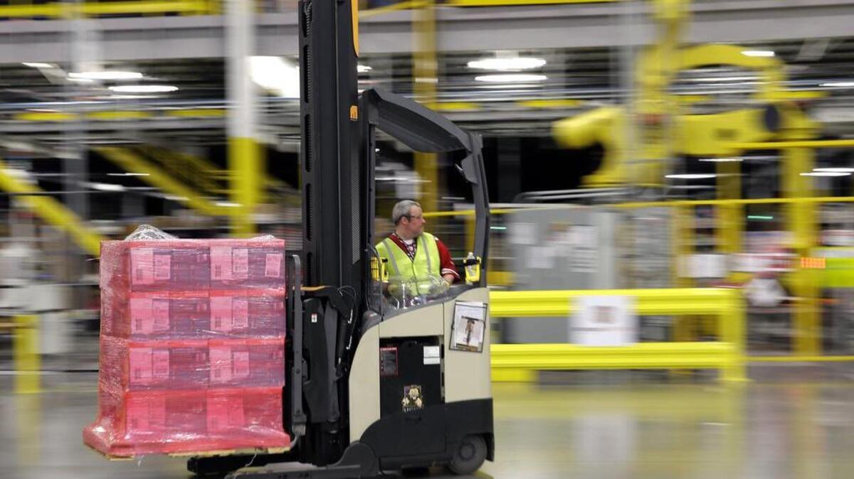 A forklift operator moves a pallet of goods at an Amazon.com fulfillment center in DuPont, Wash. In 2016, an exemption that allowed for no sales tax on Amazon purchases will expire.