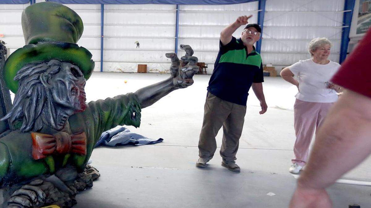 
Marc Brawner (left) talks to a few curious people inside Little Spider Creations in North Myrtle Beach on Wednesday.
