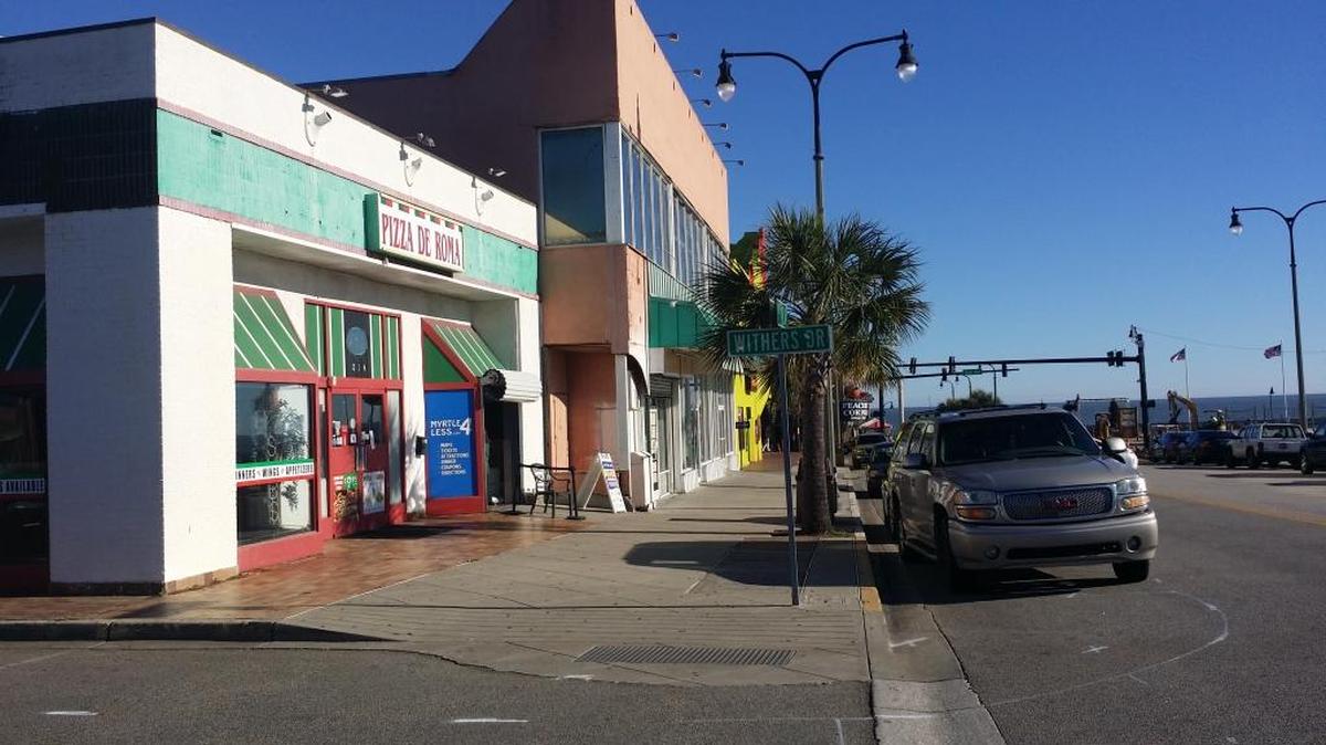 Larry Bond, owner of The Chemist and Art Burger, plans to renovate Pizza De Roma at Withers Drive and Ninth Avenue North into an ocean-view cafe.