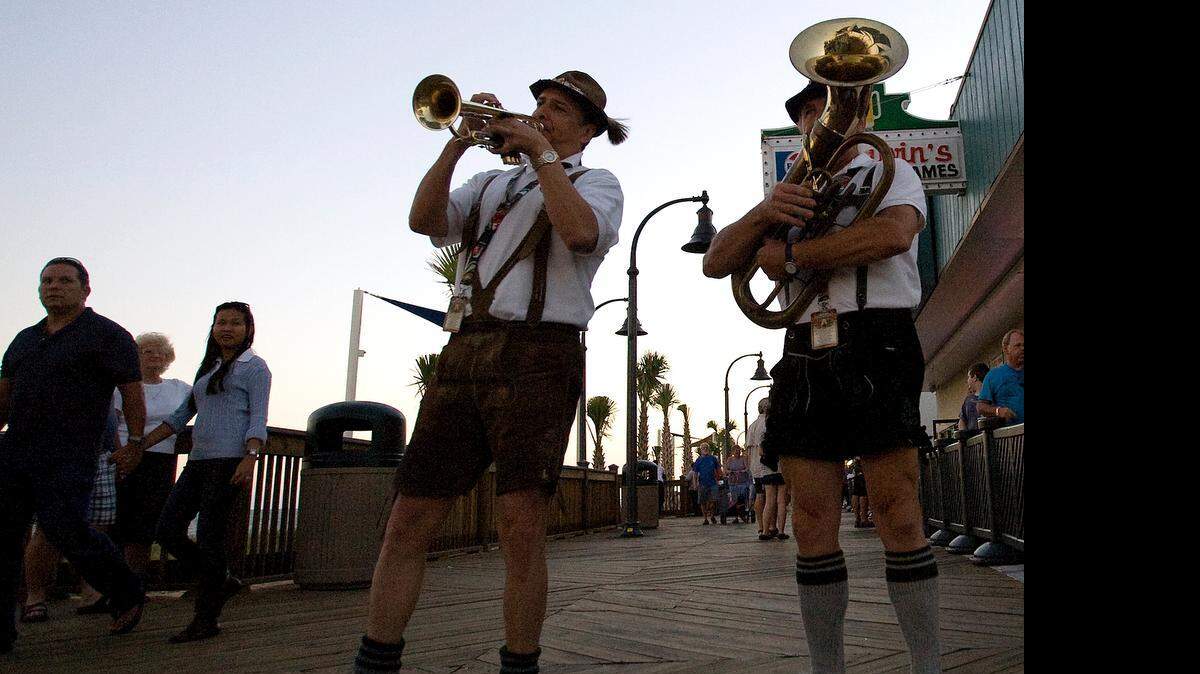 
Fabio Mann (left) and Rudy Volkmann play traditional German music on the Myrtle Beach boardwalk during Oktoberfest 2010. The Oceanfront Merchants Association organizes the annual Oktoberfest festival in downtown Myrtle Beach. 
