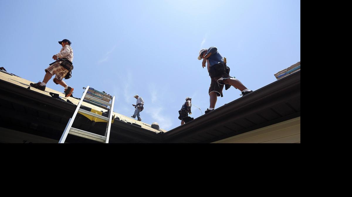 
MyStrongHome is doing some roofing work on a home in the Murrells Inlet area on Tuesday, June 23, 2015. The pilot program offers cost-effective approaches to consumers. The home is located off Hummingbird Drive in Woodlake Village.
