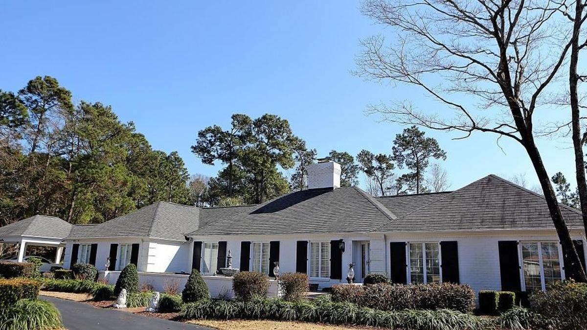 This home in the Cliffwood Estates section of Myrtle Beach has a price tag of more than $1 million on Thursday. Sales of high-end homes on the Grand Strand are going up. Cliffwood Estates is east of the Intracoastal Waterway near the Grande Dunes community. This home includes the main home, a pool and a guest house.