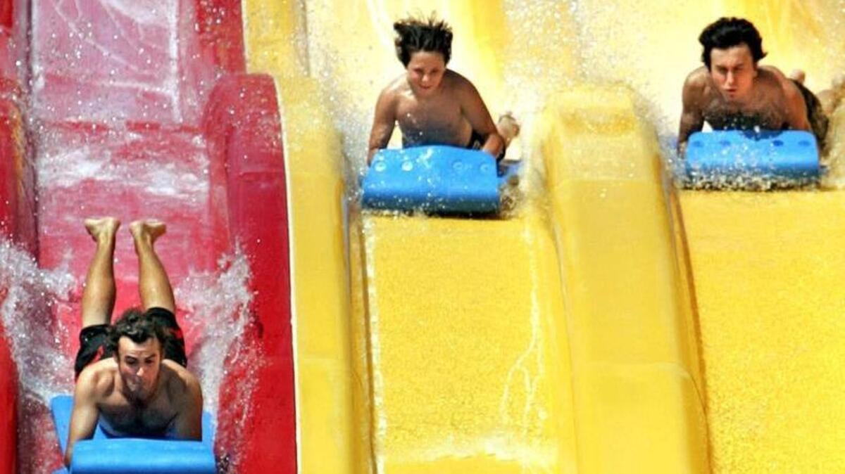 People go down slides at Wild Water & Wheels in Surfside Beach in this 2018 Sun News file photo.