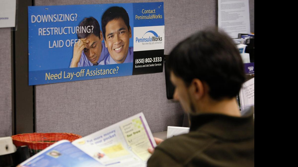 
A person looks for work at a job placement center.
