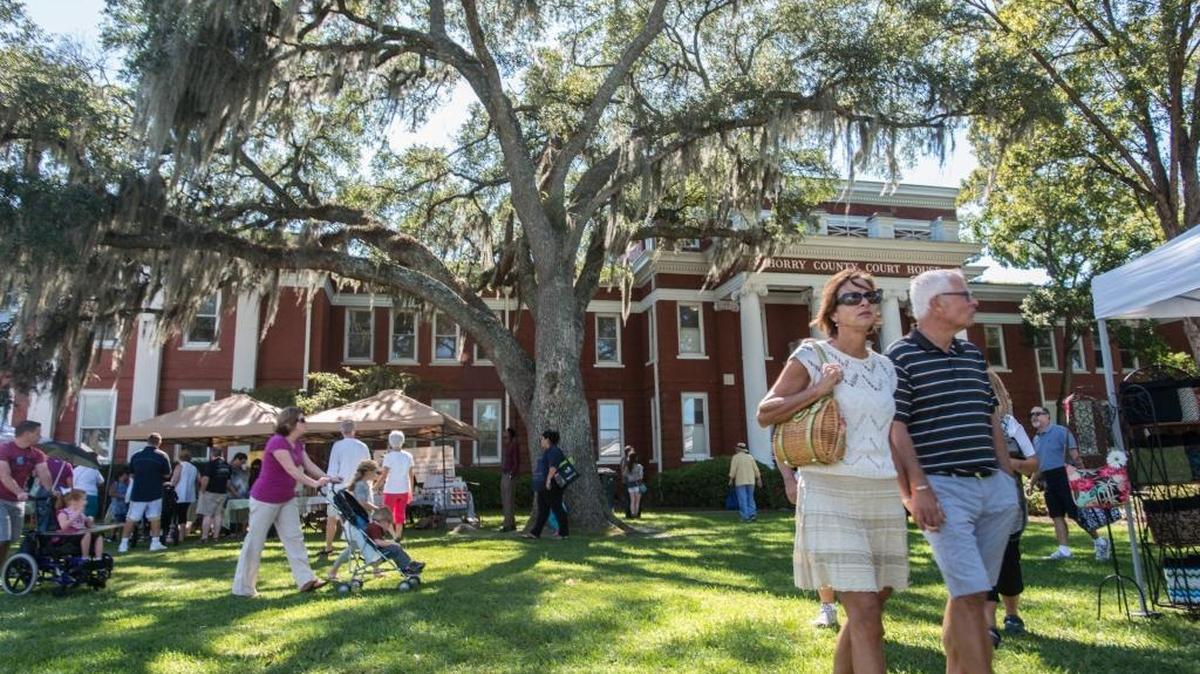 Residents and visitors enjoyed the Live Oak Festival outside the Horry County Courthouse in this 2015 file photo.