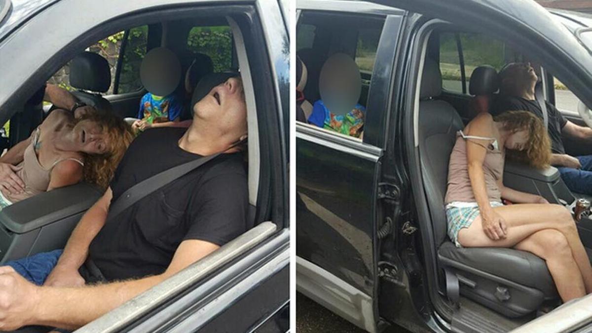 A photo released by the East Liverpool Police Department shows two adults, who police believe were on heroin, passed out in a car with a little boy in the backseat.