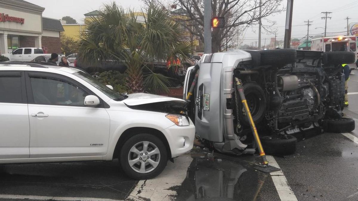 An SUV was knocked on its side during a multiple-vehicle wreck at 6th Avenue South in Myrtle Beach on Sunaday.