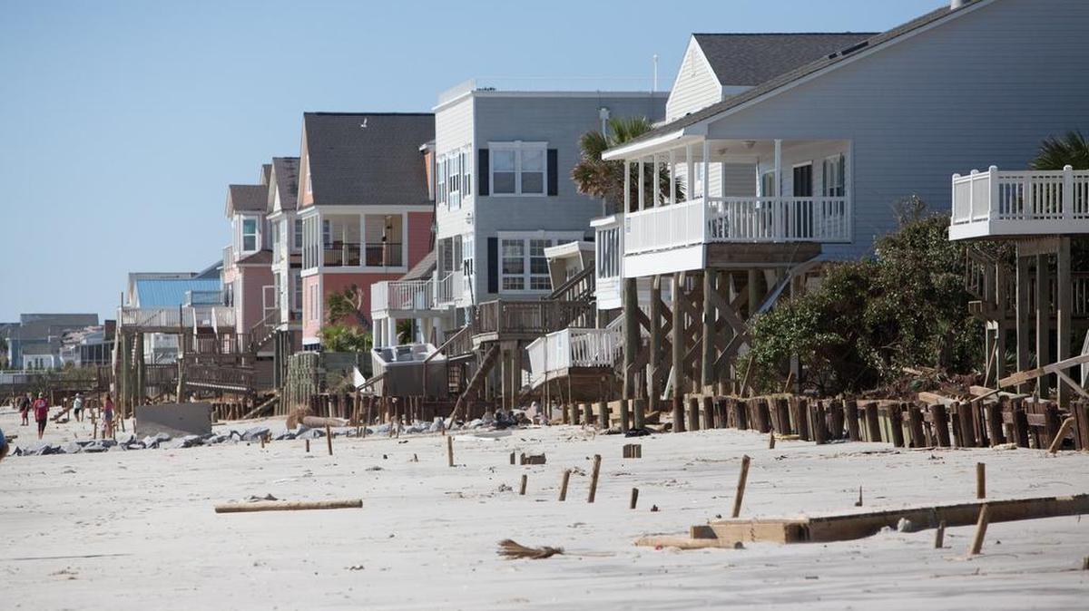 Countless beach house decks and walkovers lie in splinters on Oct. 9, along Garden City Beach, the day after Hurricane Matthew desolated the Carolinas. The deadline is Friday for local homeowners whose outdoor living spaces were damaged by the storm to apply for 1 of 4 opportunities to have a dock or outdoor deck rebuilt for free, through AZEK Building Products’ Helping Hand program. To enter, or nominate someone affected, visit azek.com/helpinghand.