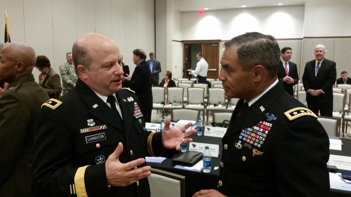 Maj. Gen. Robert Livingston (L), Adjutant General of South Carolina, talks with Lt. Gen. Michael Garrett, commander of U.S. Army Central Commander, at a briefing with Gov. Nikki Haley on Wednesday.