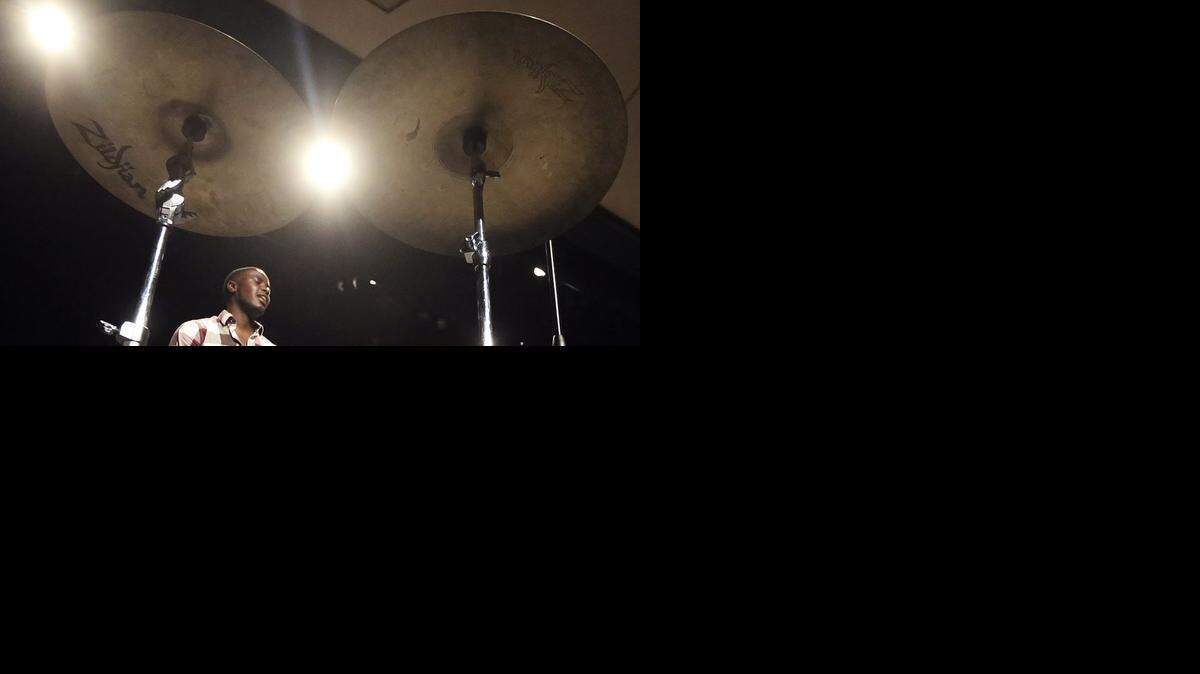 Justin Brooks and the Coastal Carolina University percussion ensemble rehearses for "Hands Up" in Wheelwright Auditorium.
