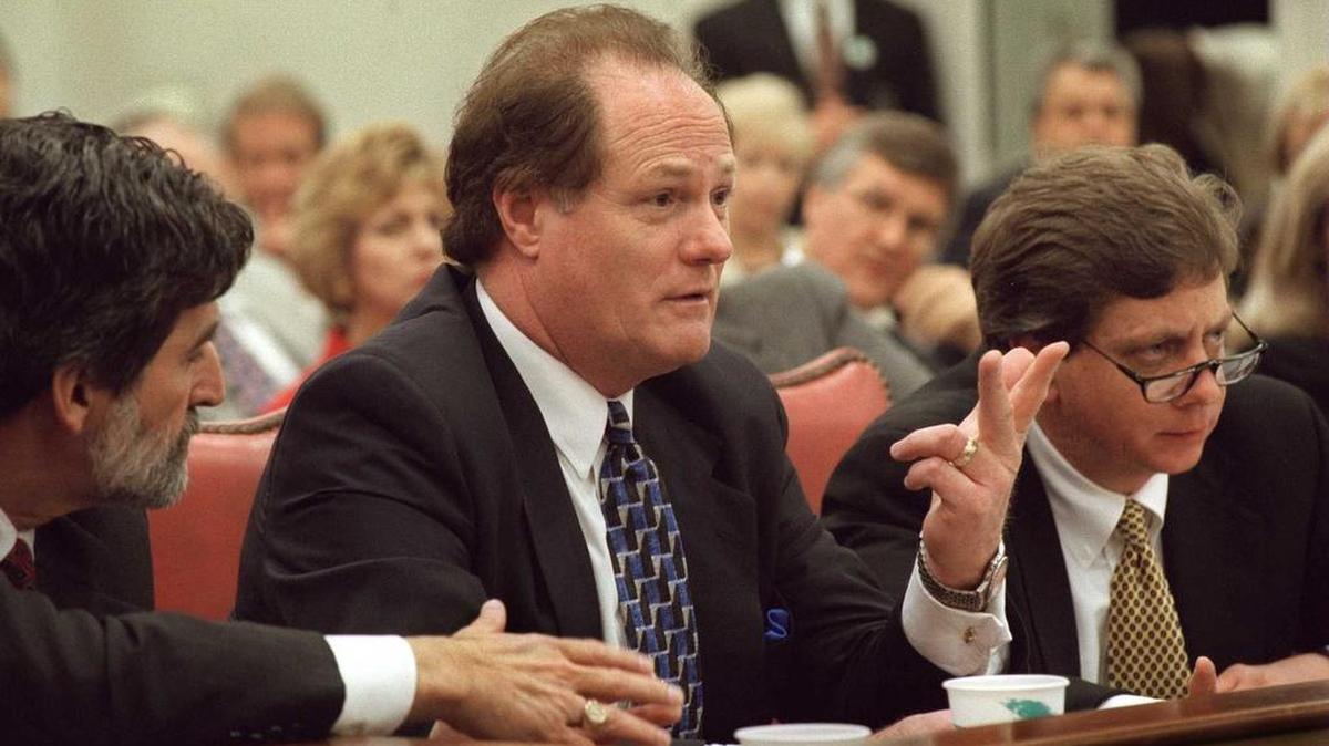 Former lobbyist Ron Cobb, center, testifies in federal court March 13, 1998, as part of the Operation Lost Trust investigation into corruption at the South Carolina State House. With him are lawyers Steve Schmutz, left, and Michael Spears.