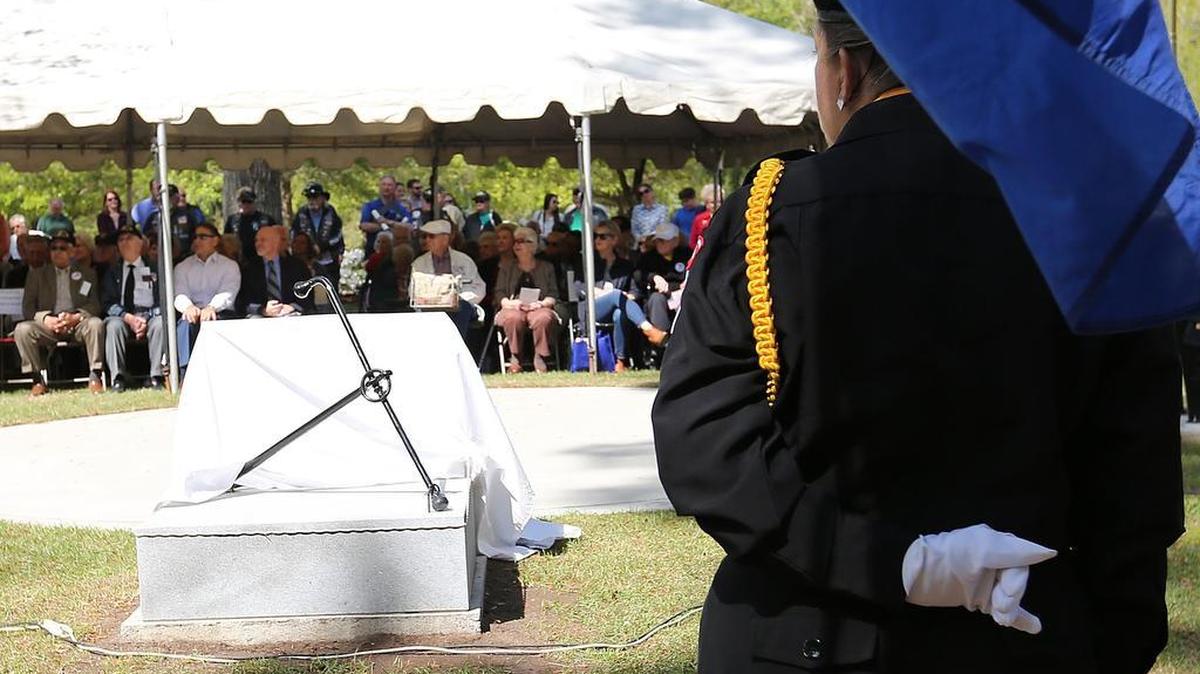 Merchant Mariners, their families and other veterans attend the John T. Schmidt Palmetto Mariners Chapter American Merchant Marines Veterans monument unveiling on Friday, April 8, 2016, at Warbird Park near The Market Common.