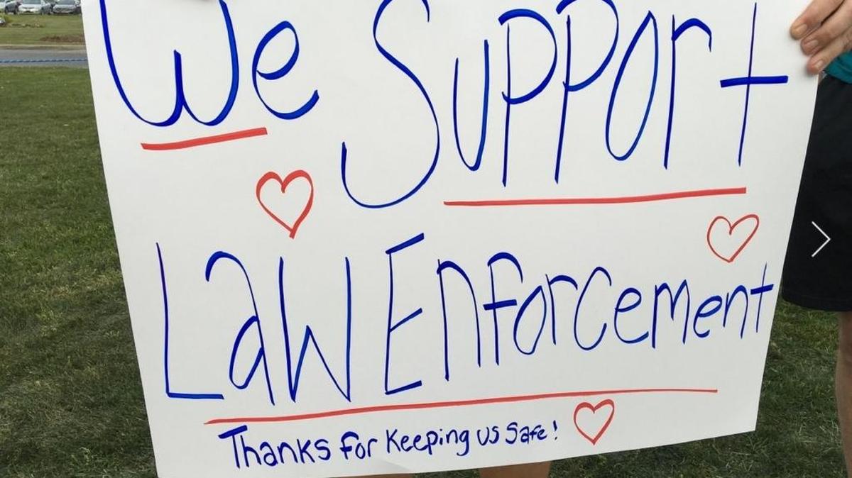 A group of Coastal Carolina University students protested as a co-founder of the Black Lives Matter movement spoke at Johnson Auditorium Tuesday night.