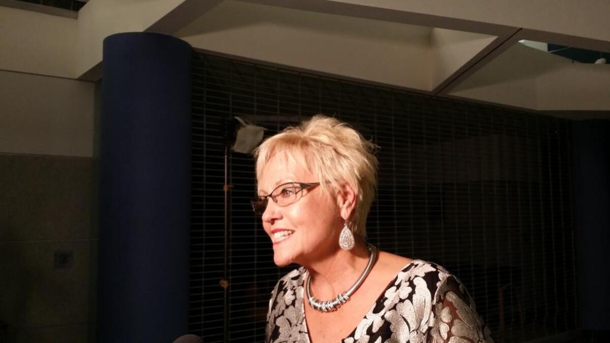 North Myrtle Beach Mayor Marilyn Hatley speaks to reports Tuesday after winning reelection to a fourth term in office.