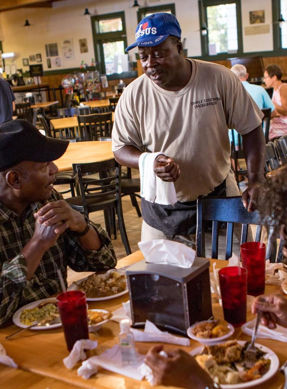 Issac Collington busses tables and sings gospel songs at Simply Southern Smokehouse on Mr. Joe White Avenue in Myrtle Beach Friday, August 26, 2016.