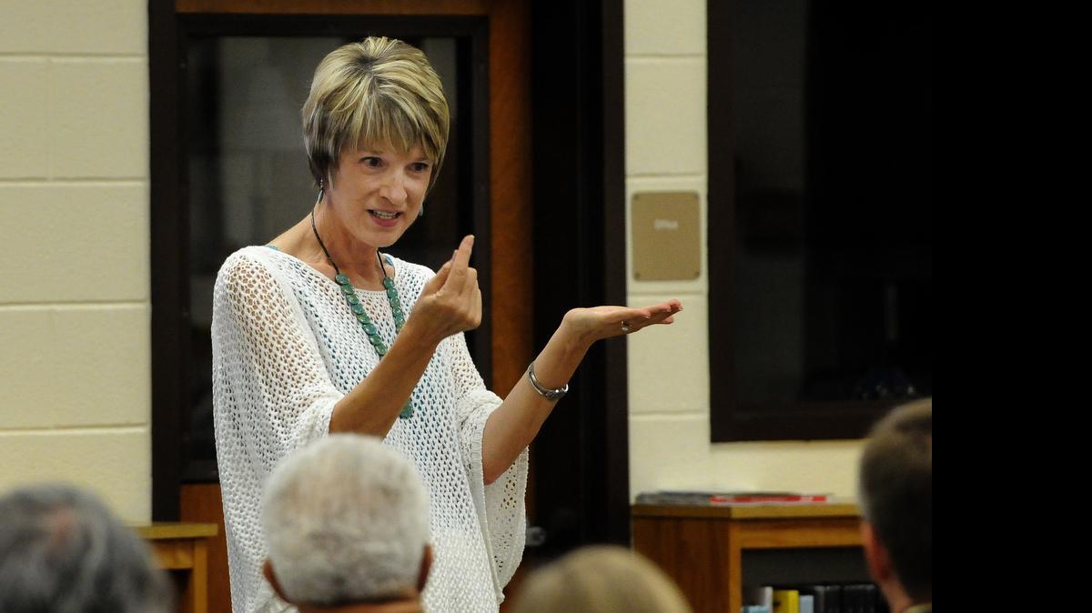 
Gerrita Postlewait, representing the Education and Workforce Development Initiative of New Carolina, gives an overview of the TransformSC initiative at Whittemore Park Middle School in 2013. 
