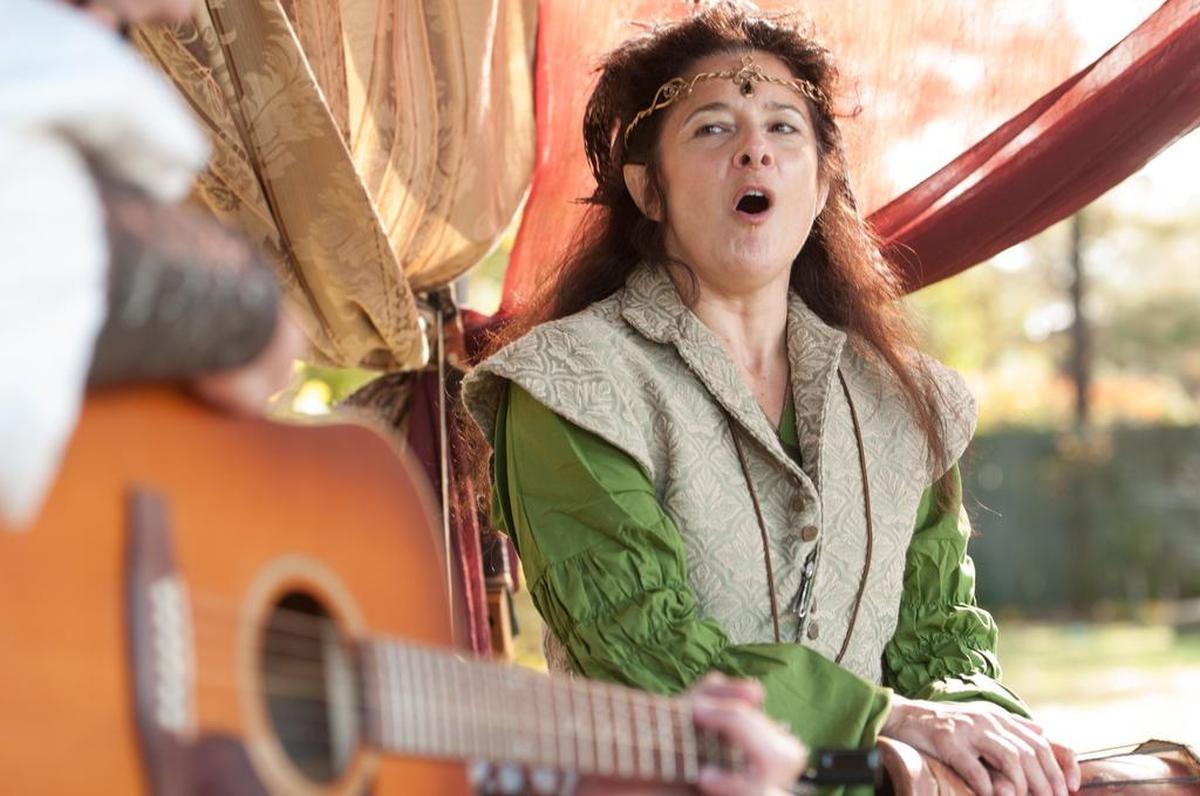 Jerry Bragg sings in her tent at the Third annual Mythical & Medieval Fest of Myrtle Beach benefiting Caleb's Dragonfly Dreams.