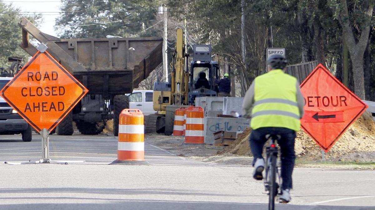 Crews are working to improve stormwater drainage on Surfside Drive near Hollywood Drive on Monday. Crews are installing new curbs and gutters as well as paving areas for parallel parking.