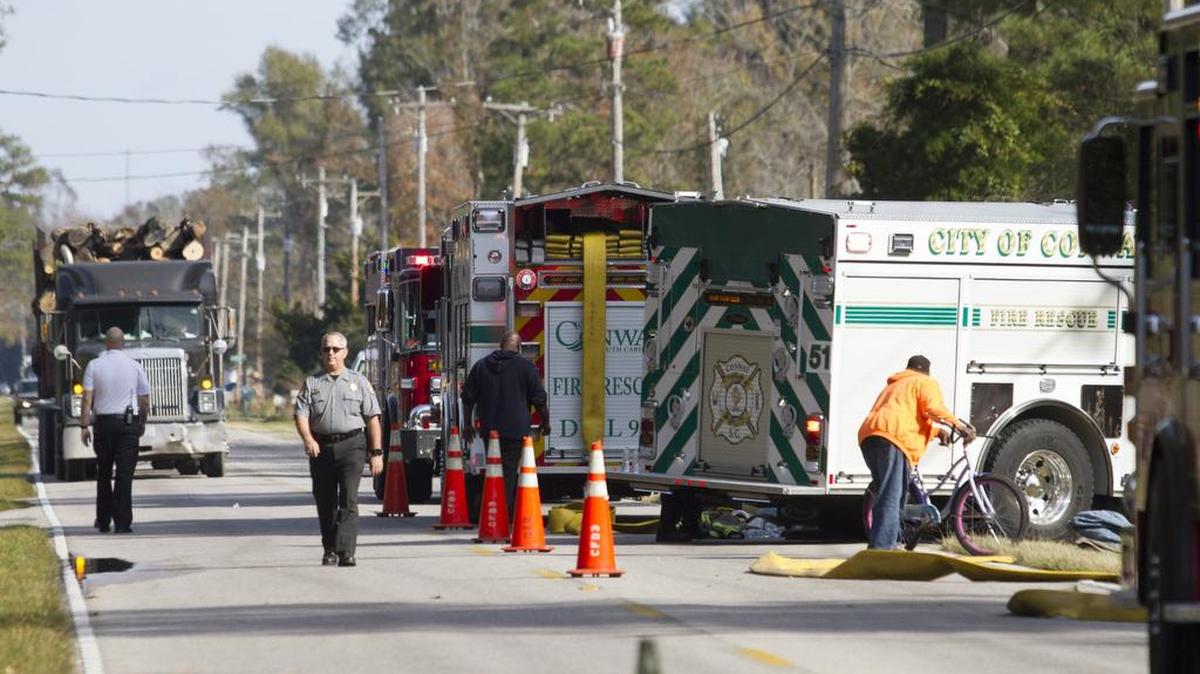 Smoke from an abandoned car fire in the woods off Highway 905 outside of Conway shut down both lanes of traffic around noon on Wednesday with Horry County and Conway Fire Rescue responding to the incident. Tuesday, Nov. 22, 2017.