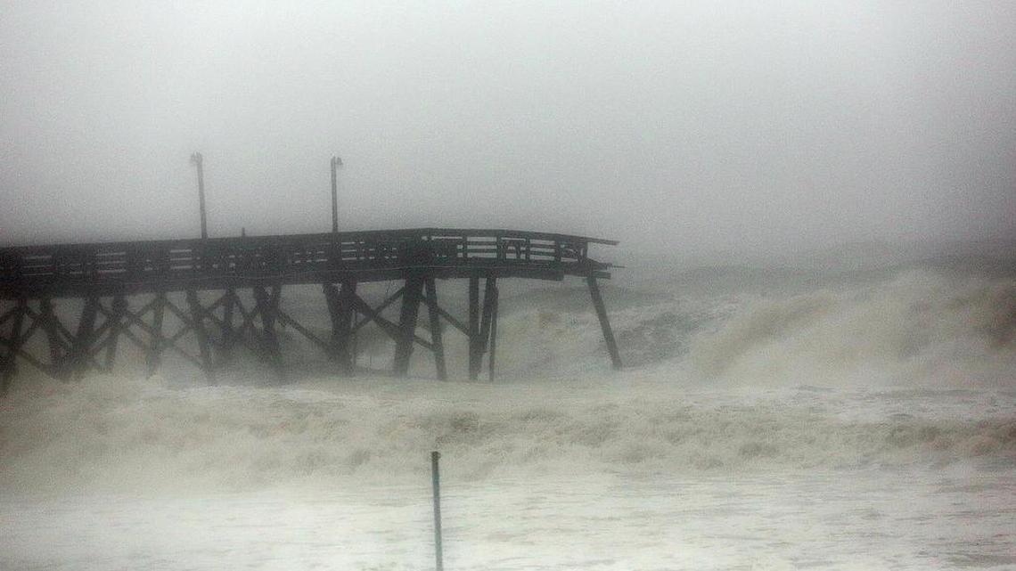 Surfside Beach Pier on Saturday, Oct. 8, 2016, as high tide comes in and Hurricane Matthew goes north.